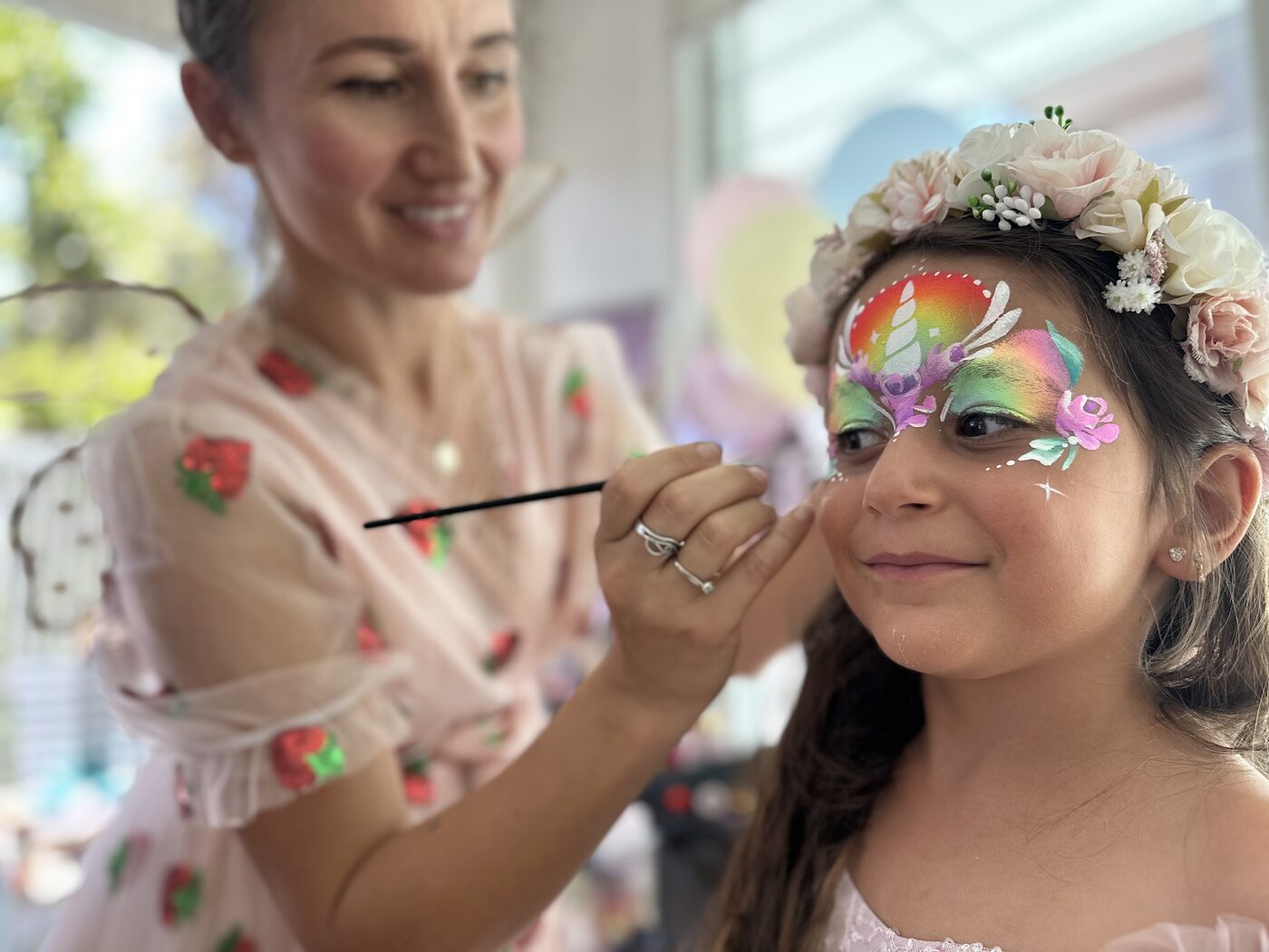 Painting a rainbow unicorn